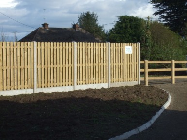 Concrete H-Post & Timber Panel Fencing